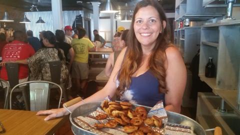 Melissa Alvarez lights up the Old Public House at its opening Saturday