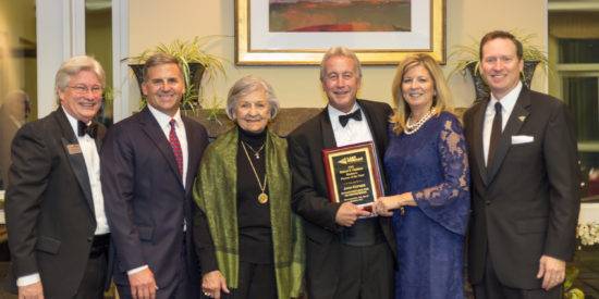 John Kepner received the Robert T. Cashion Business Person of the Year Award from the Lake Norman Chamber of Commerce. From left: Chamber CEO Bill Russell, Gordon Cashion, Louise Cashion, John and Claudia Kepner and 2016 Chamber Chair Callan H. Bryan. Photo by Ocaid Photography.