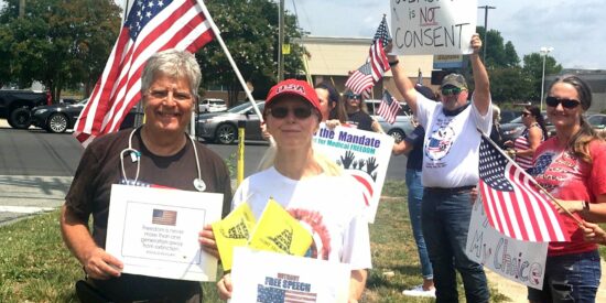 Commmissioner Miltich, left, at demonstration in Mooresville (Photo: Facebook post)