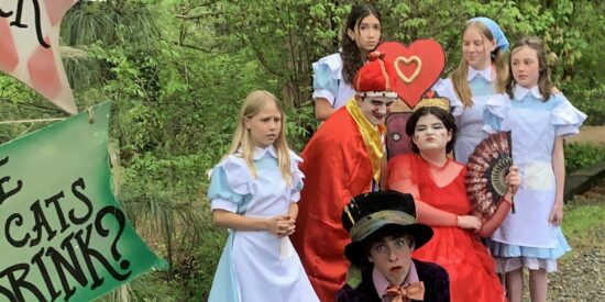 ACT's production of Alice in Wonderland, an immersive experience, includes Kohen Hamlin, bottom; Emerson Adams, Bradley English, Jewel Caceres, center row; and Madison Pinto, Mylo Sommer, Peyton Meiners, top row. Photo: Wrenn Goodrum