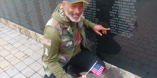 Ivy Harvell at Veterans Monument at Rotary Plaza