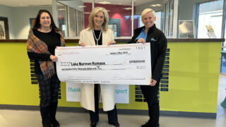 Robin Salzman, founder of Giving with Grace Foundation presents check to Lake Norman Humane’s Maria Roberson, treasurer and Dana Kelley, executive director 